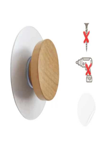 Repositionable self-adhesive towel holder